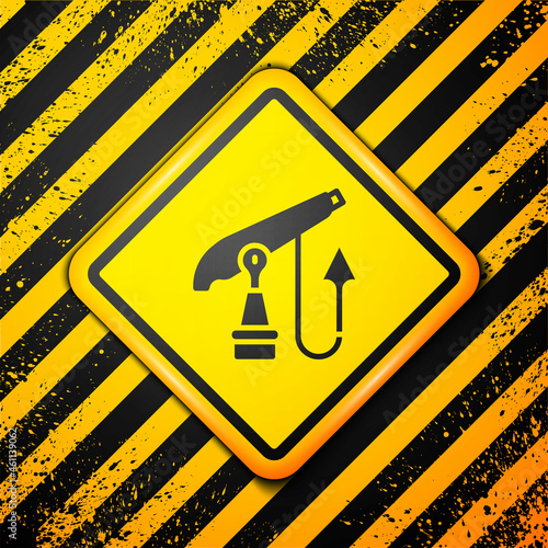 Black Fishing harpoon icon isolated on yellow background. Fishery manufacturers for catching fish under water. Diving underwater equipment. Warning sign. Vector
