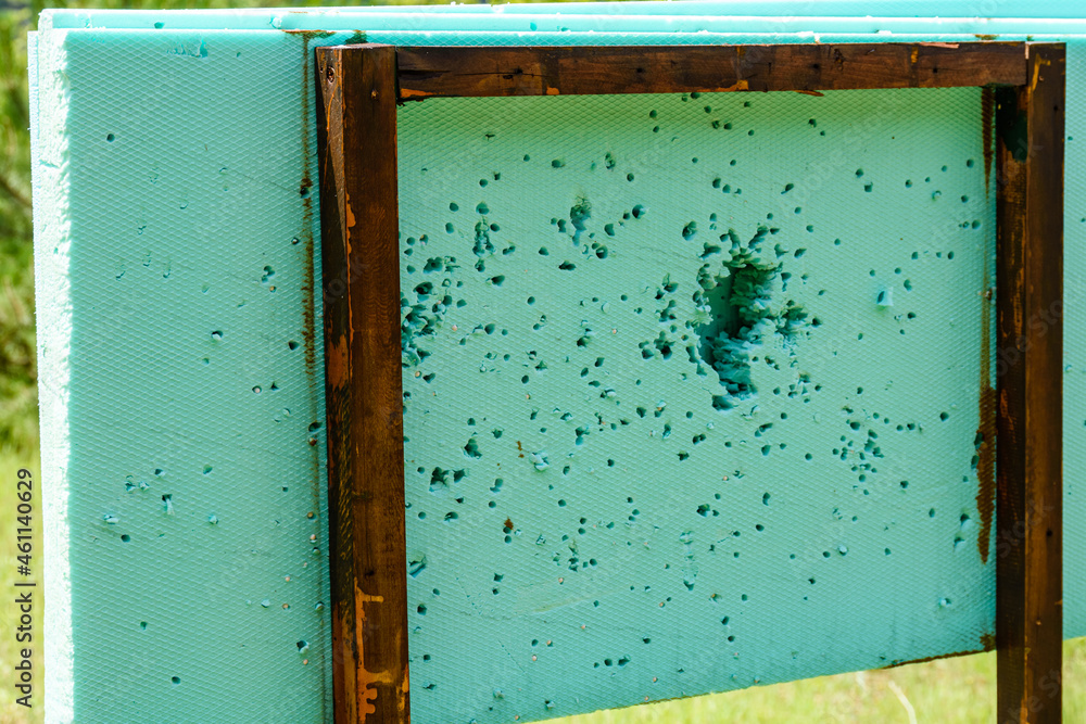 Targets for shooting with shot holes at the shooting range Targets for shooting with shot holes at the shooting range