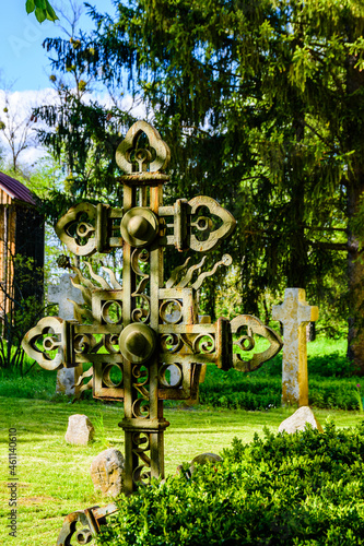 Old stone crosses at the ancient cemetery. Abandoned graveyard