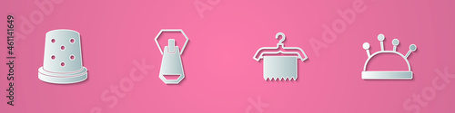 Set paper cut Thimble for sewing, Zipper, Hanger wardrobe and Needle bed and needles icon. Paper art style. Vector
