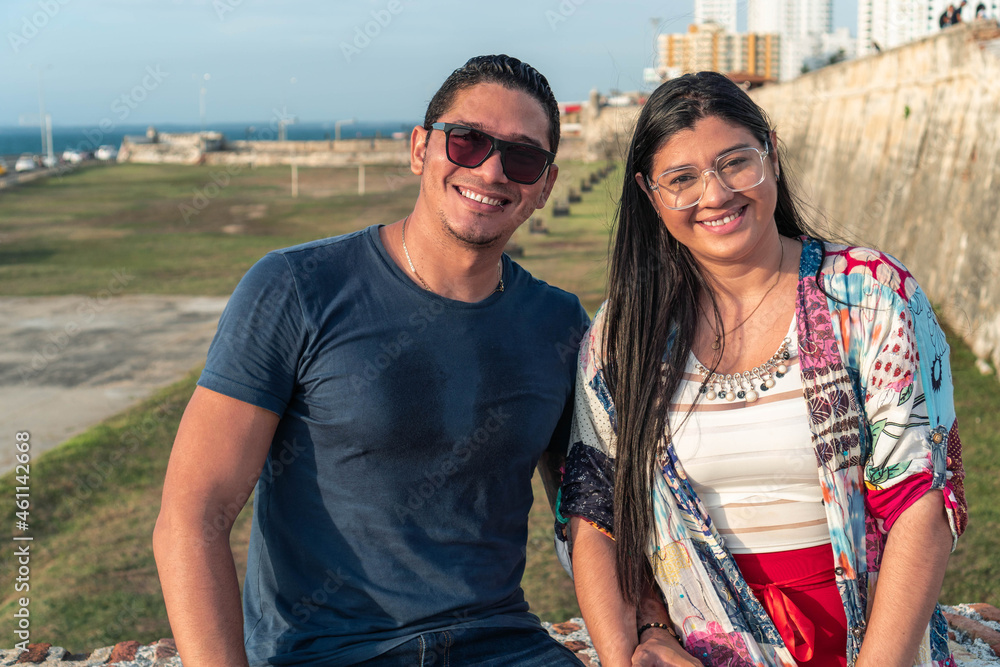 Obraz premium Portrait of Couple looking at camera in the open air