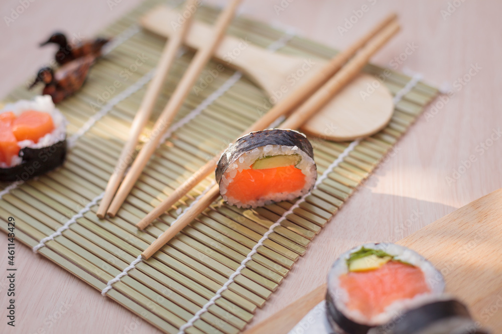 The composition of sushi, natural light. Appetizing colors. Top shot The composition of sushi, natural light. Appetizing colors. Top shot