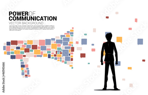 Silhouette of businessman standing with Big Megaphone from small bubble speech icon. Concept for power of comment and communication. © Panithan