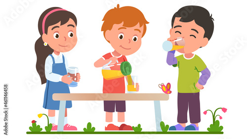Boy sharing lemonade or juice with friends