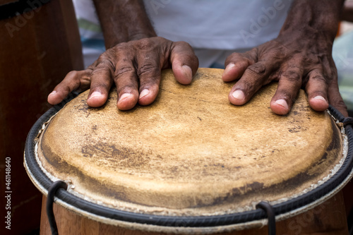 Hands of a musician playing percussion in presentation. photo