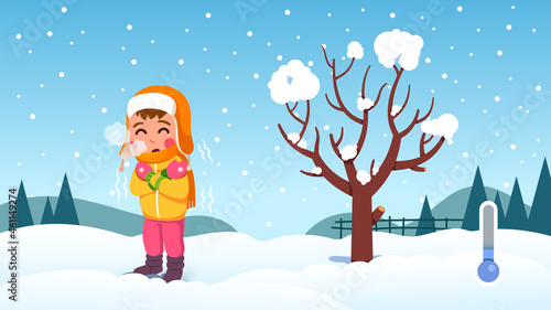 Girl kid shivering with cold on snowy winter day
