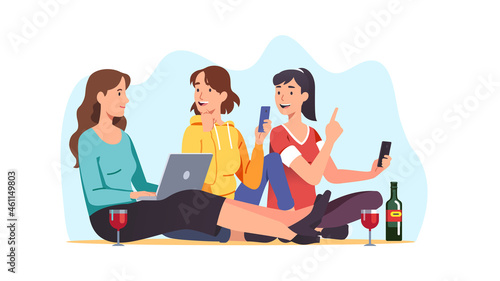 Female friends drinking wine enjoying home party