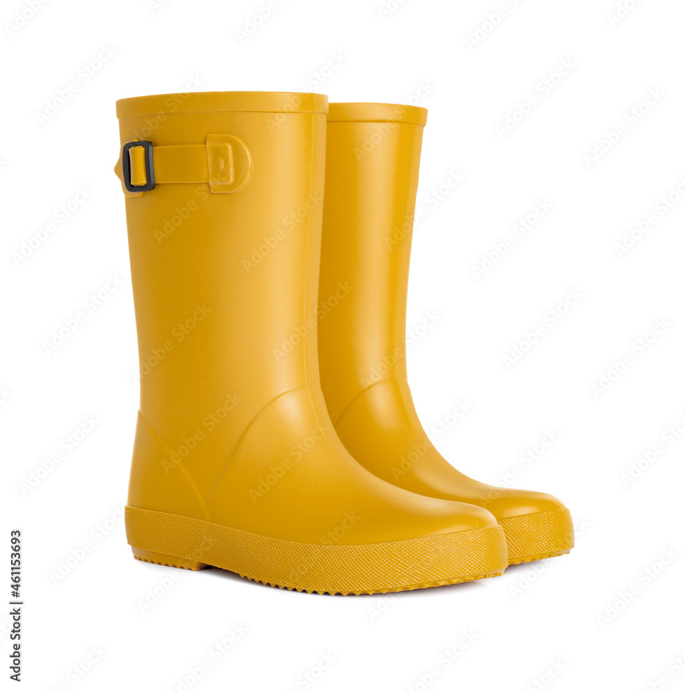 Modern yellow rubber boots isolated on white Modern yellow rubber boots isolated on white