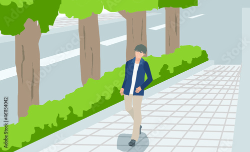 町を歩く男性