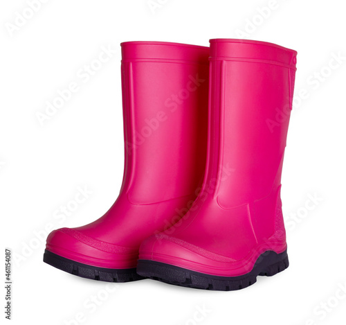 Modern pink rubber boots isolated on white