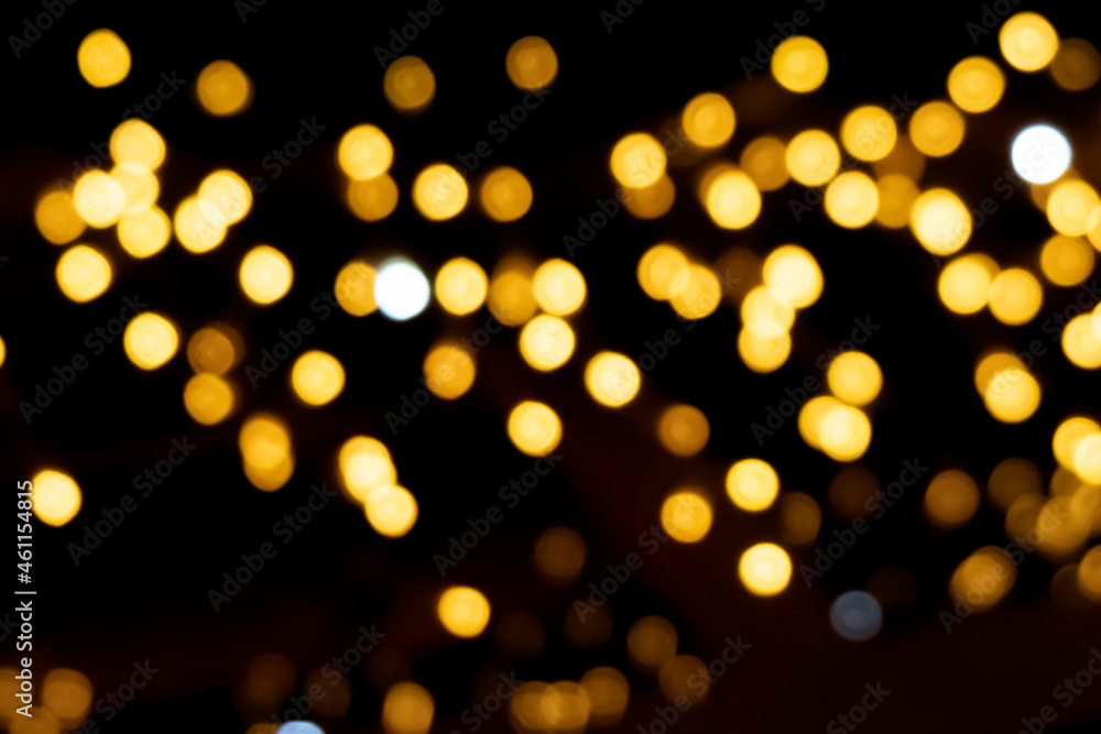 abstract bokeh background with gold lights