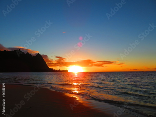 Beautiful sunset in Hawaii by ocean