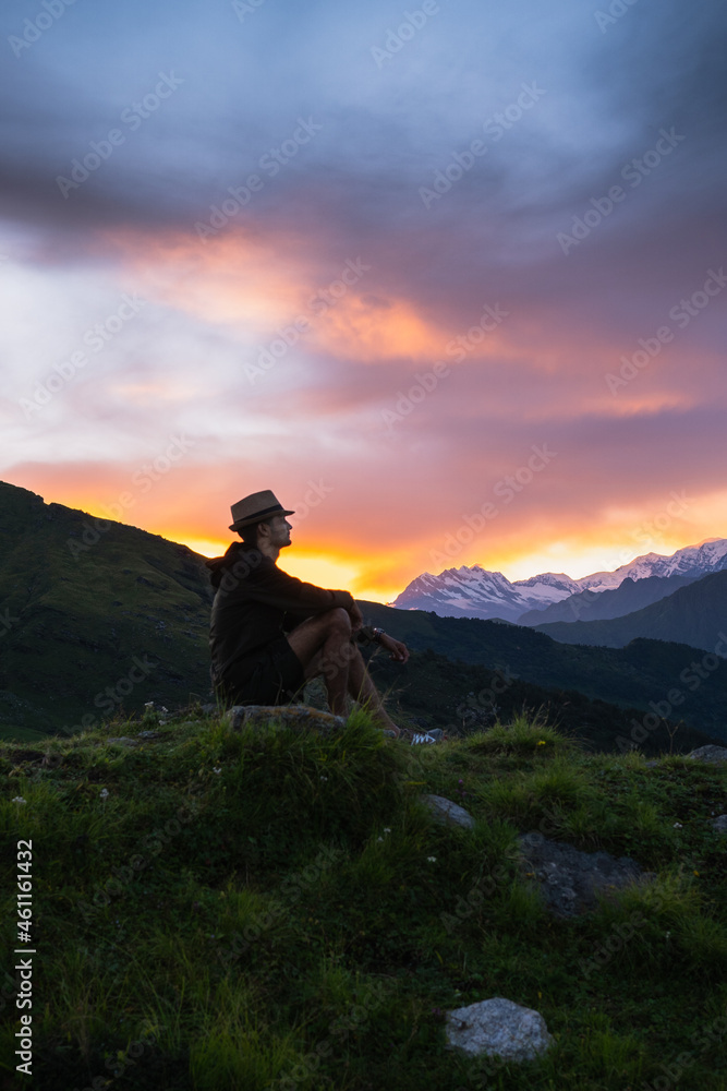 Silhouette of a person on a mountain top in Khaliya Top, Munsiyari, Uttarakhand, India