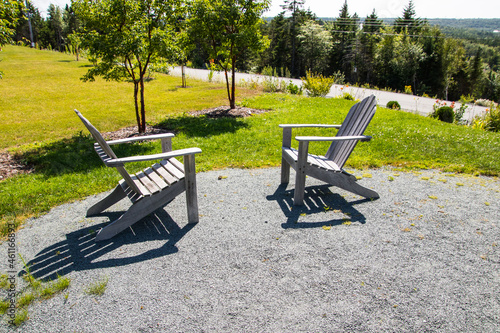 Two Adirondack chairs facing each other