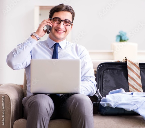 Businessman preparing for the business trip