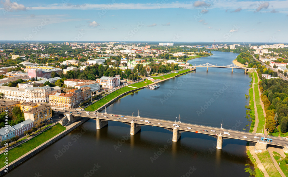 Fototapeta premium Cityscape of Tver, Russia. Bridge across Volga and observation wheel Tver Regional Picture Gallery seen from above.