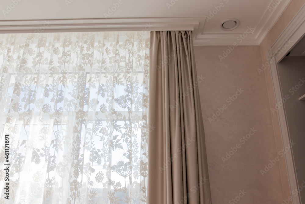 baguette on a white ceiling with the correct contour in a room with tulle and curtains baguette on a white ceiling with the correct contour in a room with tulle and curtains