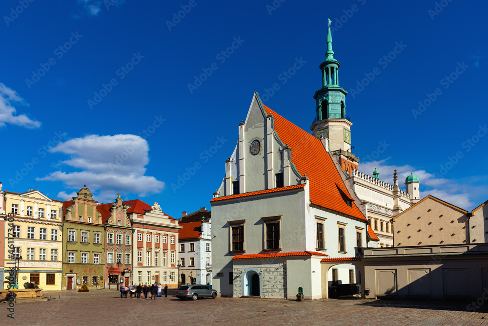 Fototapeta premium View of historic building of Weighing house and Town Hall in centre of Poznan Market Square in sunny spring day, Poland
