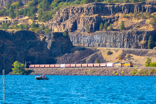 Fishing Boat and Train Along the Columbia River Near Lyle Washington photo