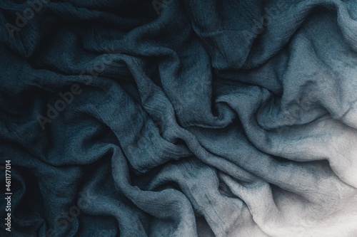 blue wavy soft folds of fabric