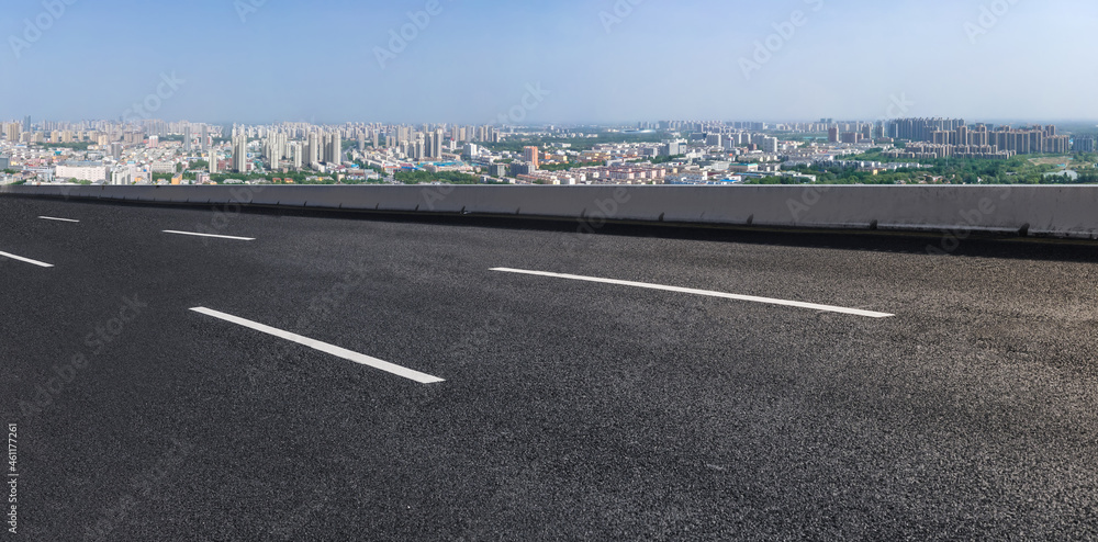 Fototapeta premium Empty asphalt road and city skyline and building landscape, China.