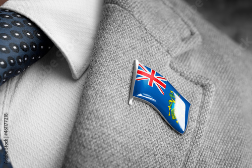 Metal badge with the flag of Pitcairn Islands on a suit lapel photo