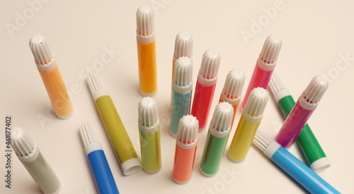 Colorful markers for draw. School desk background