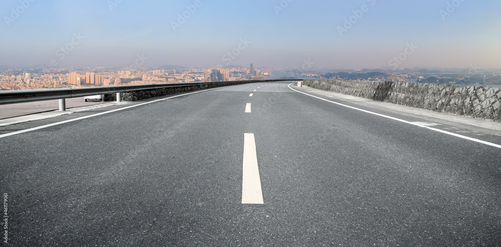 Fototapeta premium Empty asphalt road and city skyline and building landscape, China.
