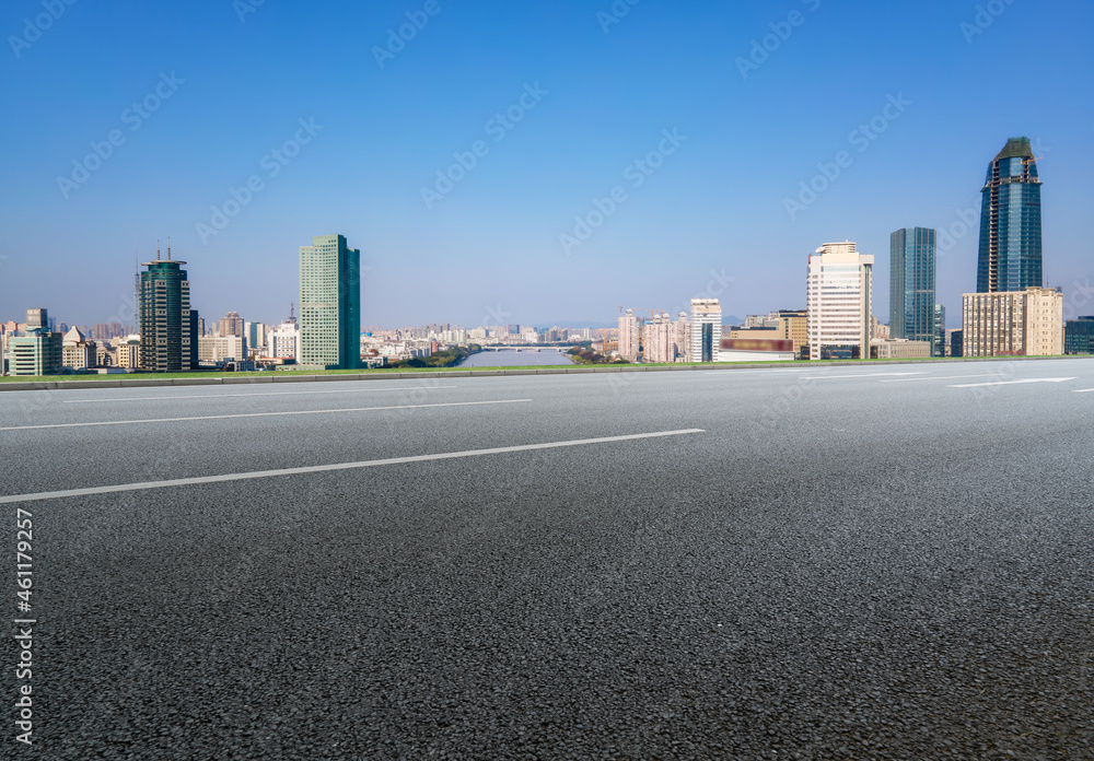 Empty asphalt road and city skyline and building landscape, China.