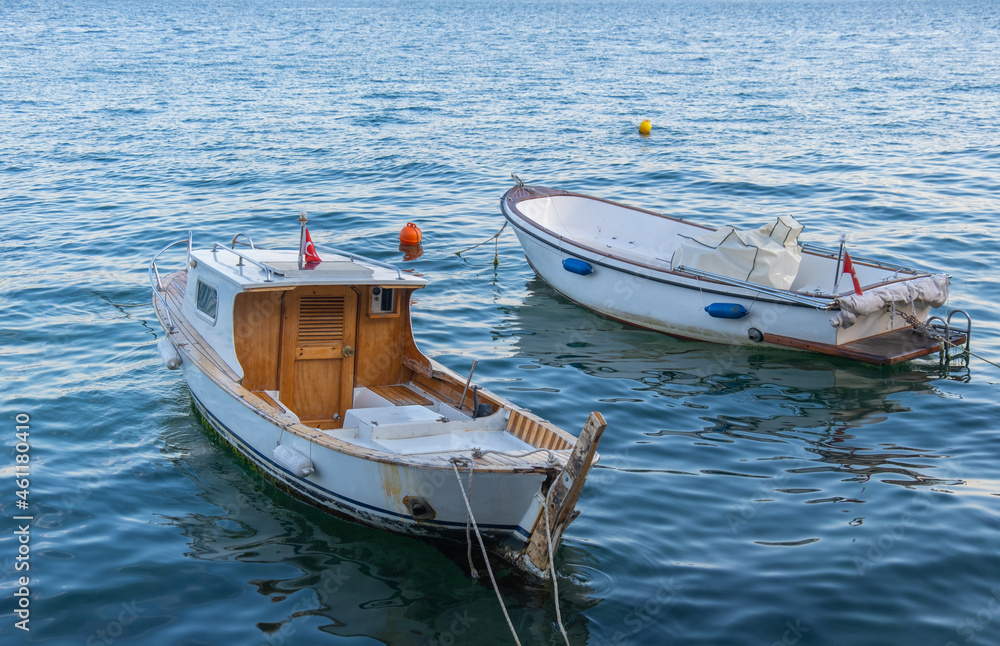 Naklejka premium boats moored to the sea shore