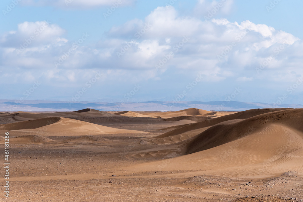 Nature and landscapes of dasht e lut or sahara desert with sand dunes and cloudy evening sky Nature and landscapes of dasht e lut or sahara desert with sand dunes and cloudy evening sky