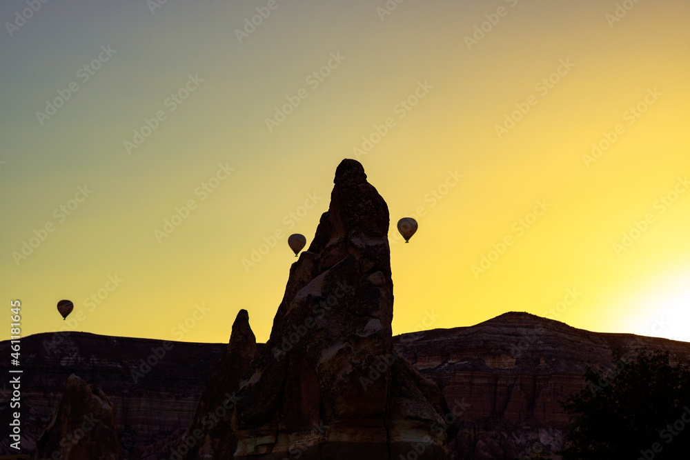 Silhouette of Fairy Chimneys and Hot Air Balloons in Cappadocia Turkey