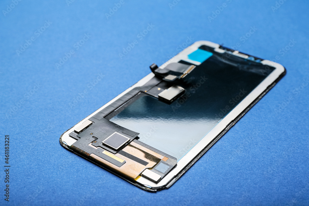 Mobile phone display module on blue background Mobile phone display module on blue background
