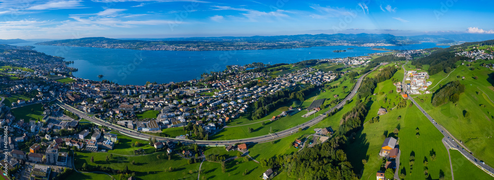 Aerial view of the city Pfäffikon Freienbach in Switzerland on a sunny afternoon.