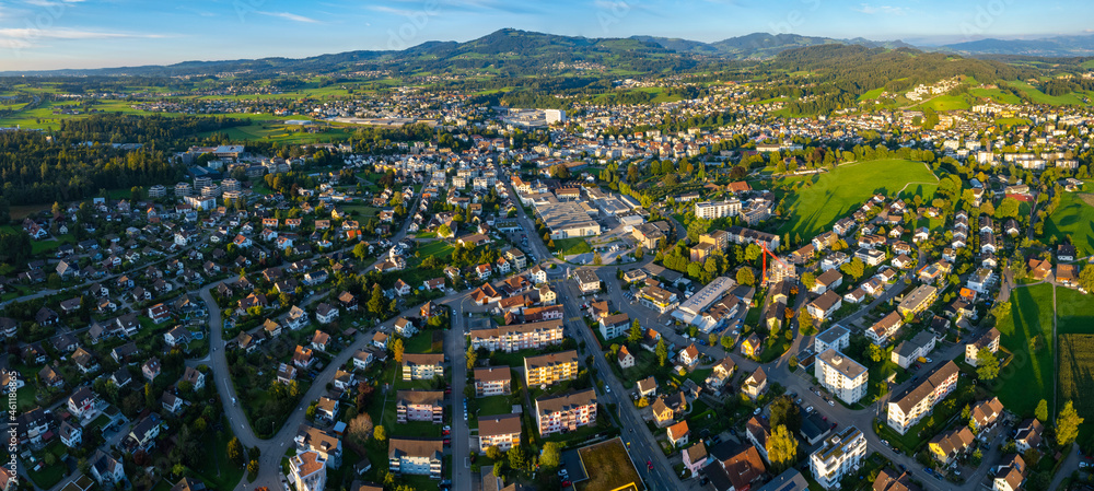 Aerial view of the city Rüti in Switzerland on a sunny late afternoon.