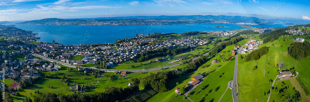 Aerial view of the city Pfäffikon Freienbach in Switzerland on a sunny afternoon.