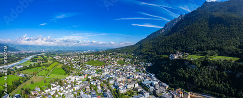 Aerial view of the city Vaduz in Liechtenstein on a sunny day in summer.	 photo
