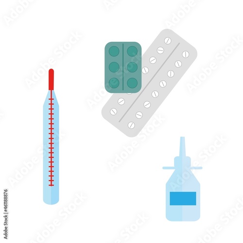 thermometer, nasal drops and cold pills