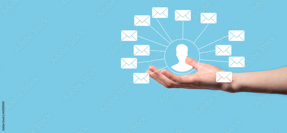 Male hand holding letter icon,email icons .Contact us by newsletter email and protect your personal information from spam mail. Customer service call center contact us.Email marketing and newsletter Male hand holding letter icon,email icons .Contact us by newsletter email and protect your personal information from spam mail. Customer service call center contact us.Email marketing and newsletter