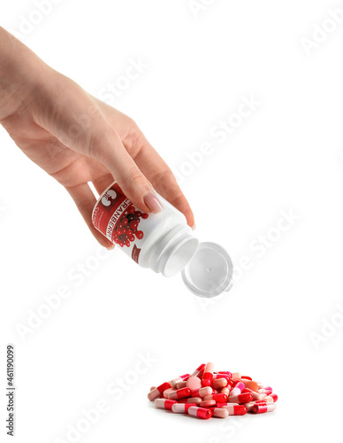 Female hand with bottle and...