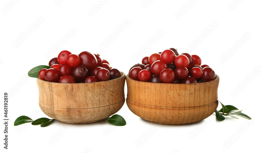 Bowls of ripe cranberries on white background Bowls of ripe cranberries on white background