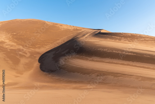 view from Nature and landscapes of dasht e lut or sahara desert after the rain with wet sand dunes and cloudy sky. Middle East desert