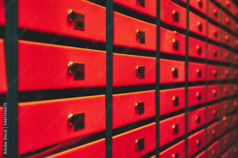 Orange Mailboxes in an apartment residential building