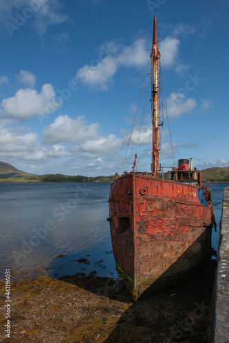 Abandoned ship. Rusty shipwreck. Pibroch. Ireland Connemara Westcoast. Steamboat. photo