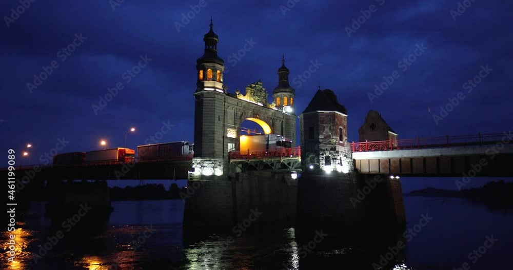 Illuminated Queen Louise Bridge in Sovetsk at dusk Illuminated Queen Louise Bridge in Sovetsk at dusk
