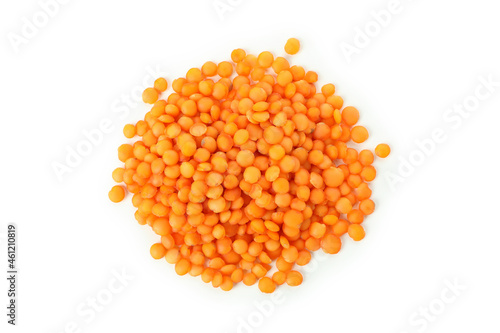 Handful of red lentils isolated on white background