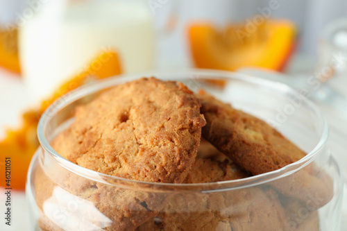 Concept of tasty food with pumpkin cookies, close up