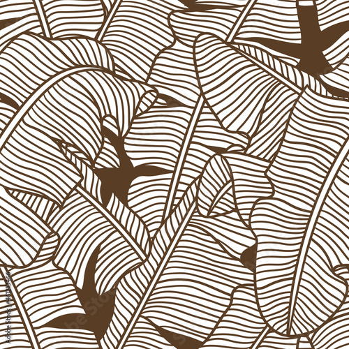 Seamless pattern with stylized banana palm leaves. Decorative image of tropical foliage and plants.