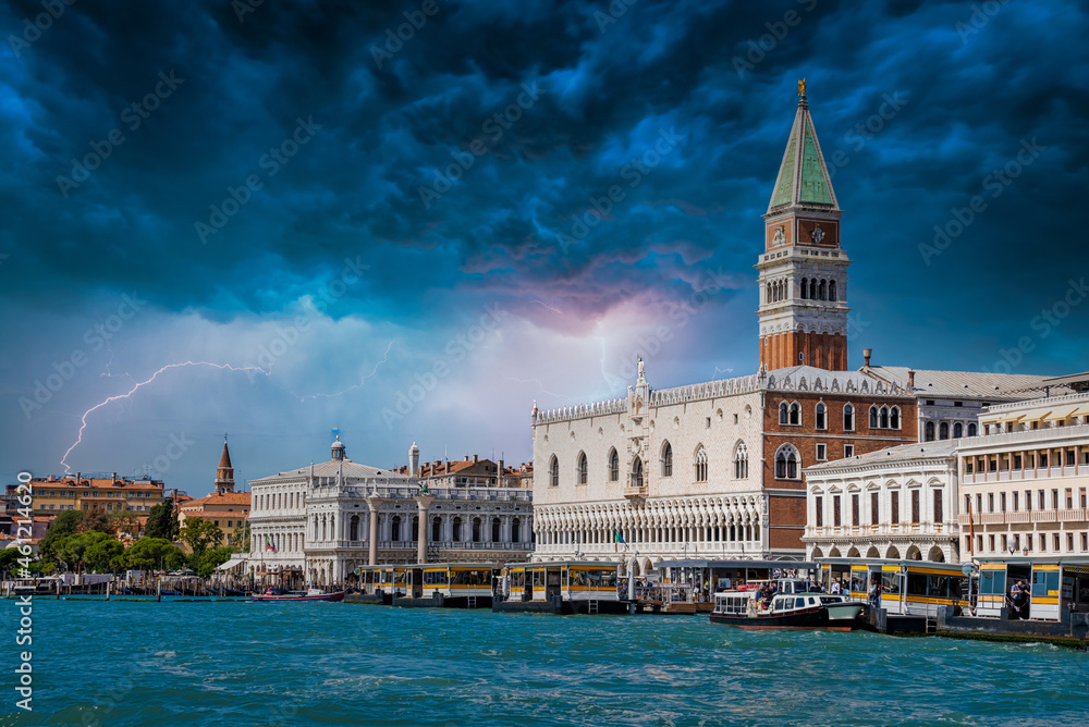 St Mark's Campanile tower in Venice, Italy. Beautiful tower at the St. Mark's Square during heavy storm and lightening..