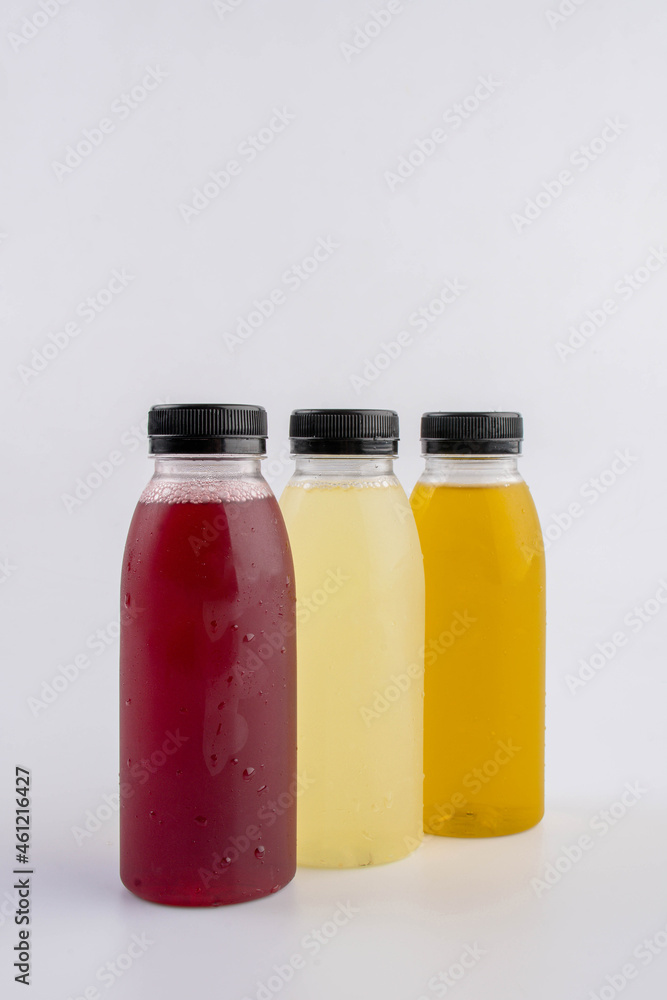 Fruit and vegetable juice bottles isolated on white background Fruit and vegetable juice bottles isolated on white background